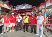 Bhabinkamtibmas Polsek Telukjambe Bersama Babinsa dan Pemdes Sukamakmur Kawal Jalan Santai Sambut HUT RI ke-81