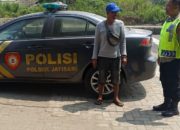 Polsek Jatisari Melaksanakan Patroli Siang Sapa Warga di Pertigaan Kertajaya
