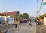 Kapolsek Pangkalan Beserta Personel Konsisten Gelar Gatur Pagi di Depan Sekolah saat Kegiatan Sapa Warga