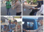 Antisipasi Debu Vulkanik, Polsek Rangkasbitung Polres Lebak Bagikan Masker kepada Warga dan Pengguna Jalan